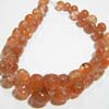 This listing is for the 49 Pieces of AA Quality Sunstone Smooth Onion Briolettes in size of 6 - 10 mm approx,,Length: 8 inch